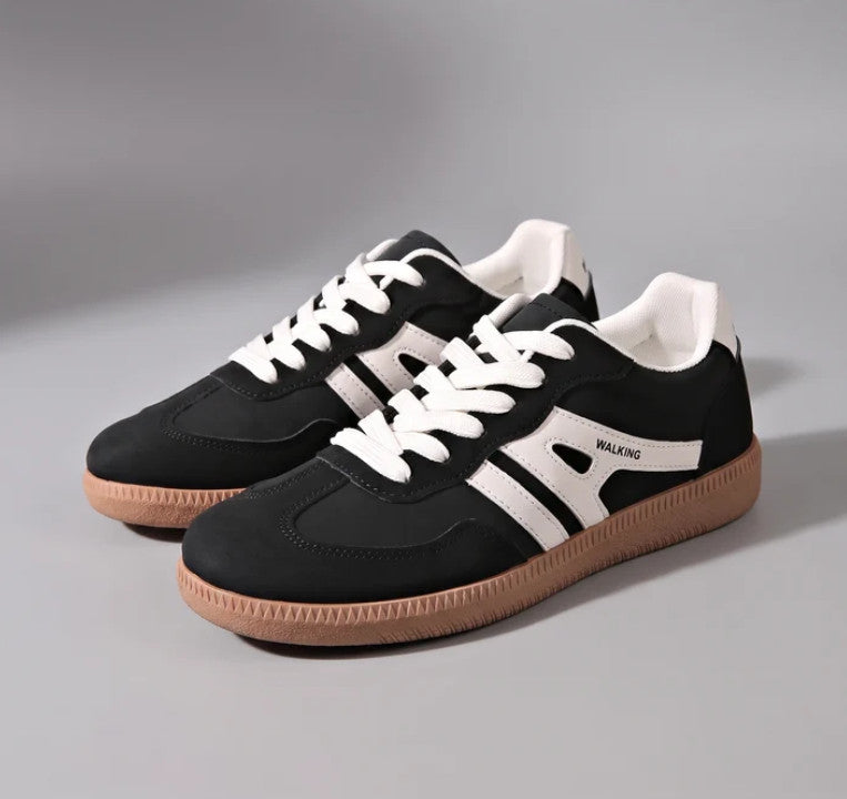 Ava Sneakers in black, three-quarter view