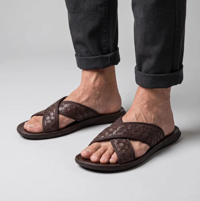 Briony Sandals in brown, worn with dark trousers