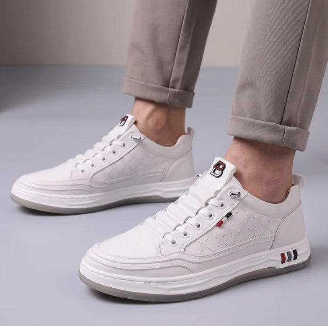 Corwin Sneakers in white, worn with cuffed trousers