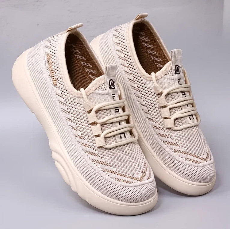Evelyn Trainers in cream, three-quarter view