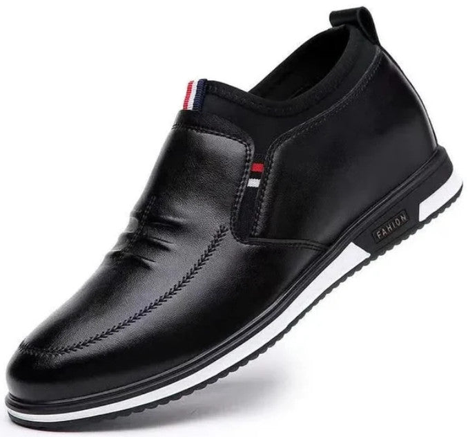 Liam Slip-On Sneakers in black, three-quarter view