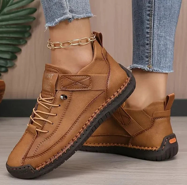 Mia Sneakers in camel, worn with frayed jeans