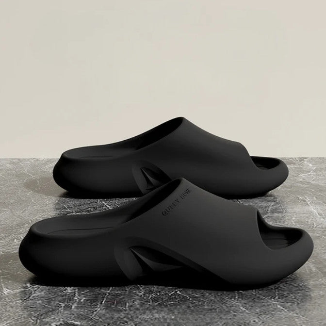 Niko Foam Slides in black, side view