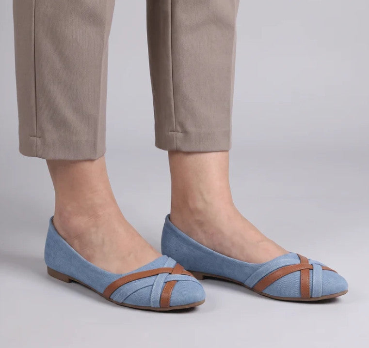Roos Slip-On Flats in light blue, worn with tapered trousers
